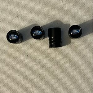 Ford valve Stem caps in Black set of 4 NWT